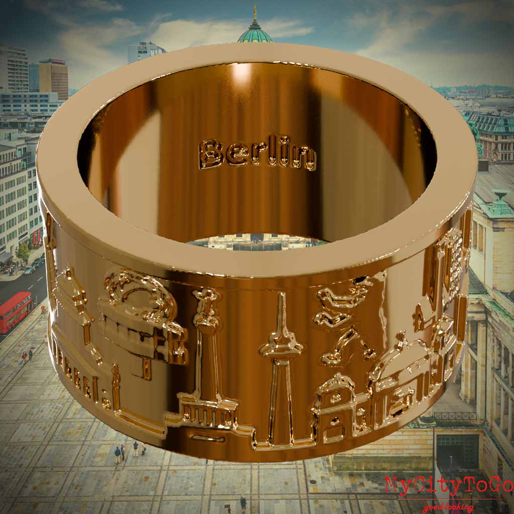Innenseite eines vergoldeten Rings mit Reliefs bekannter Sehenswürdigkeiten der Stadt Berlin und einer Gravur des Stadtnamens