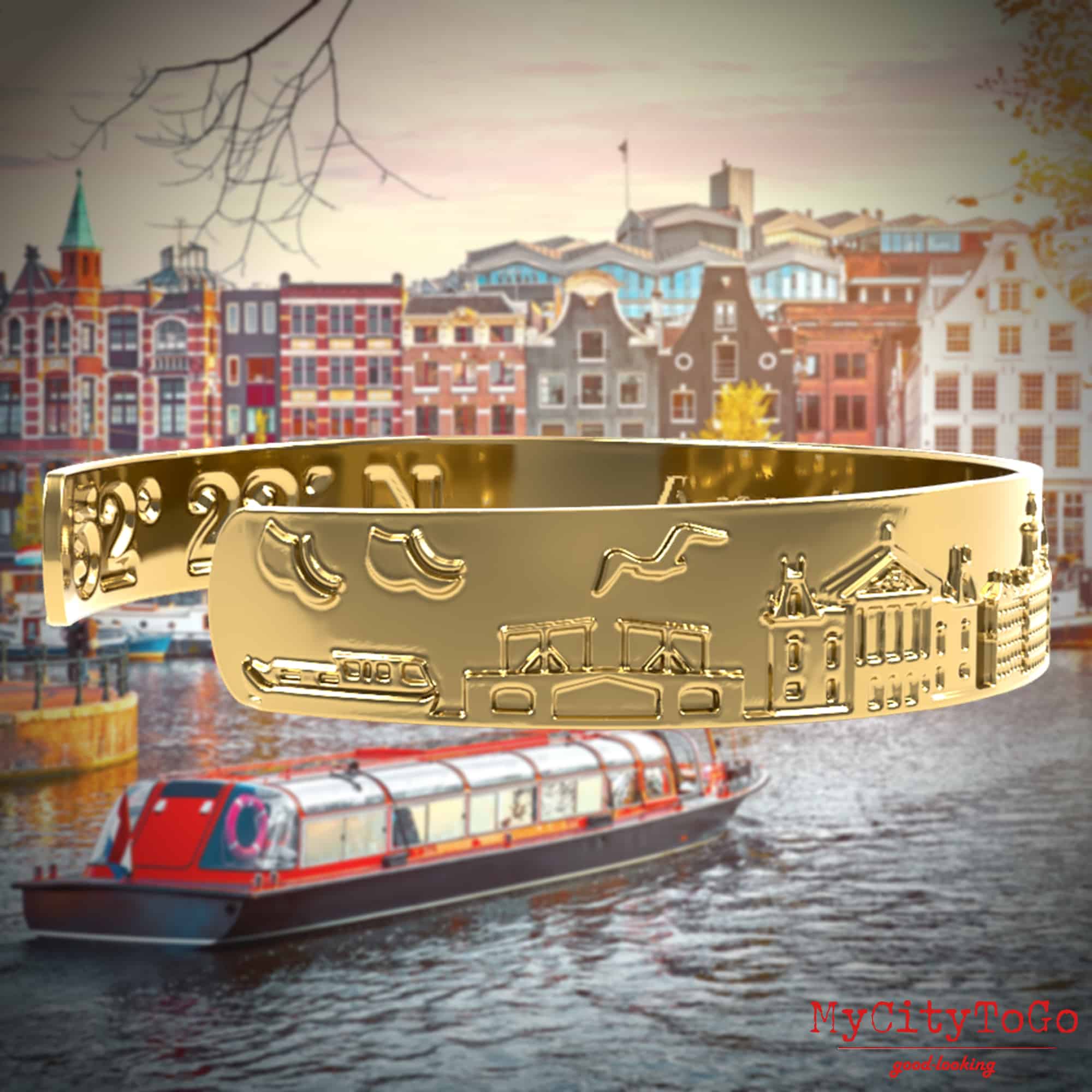 golden bracelet with motifs from amsterdam