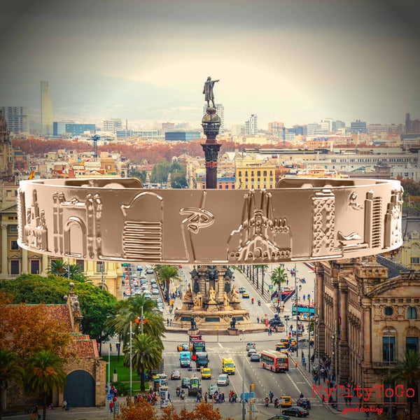 Armreif mit Reliefs bekannter Motive der Stadt Barcelona in Rotgold