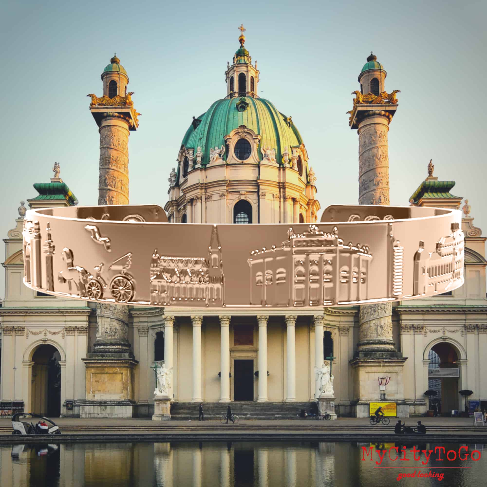 Armreif mit Reliefs bekannter Motive der Stadt Wien in Rotgold