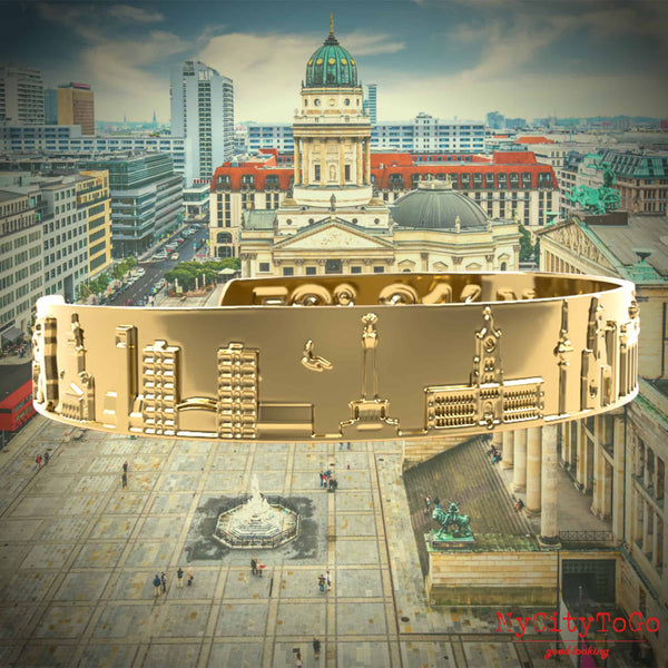 A golden bracelet with famous motifs from the city of Berlin