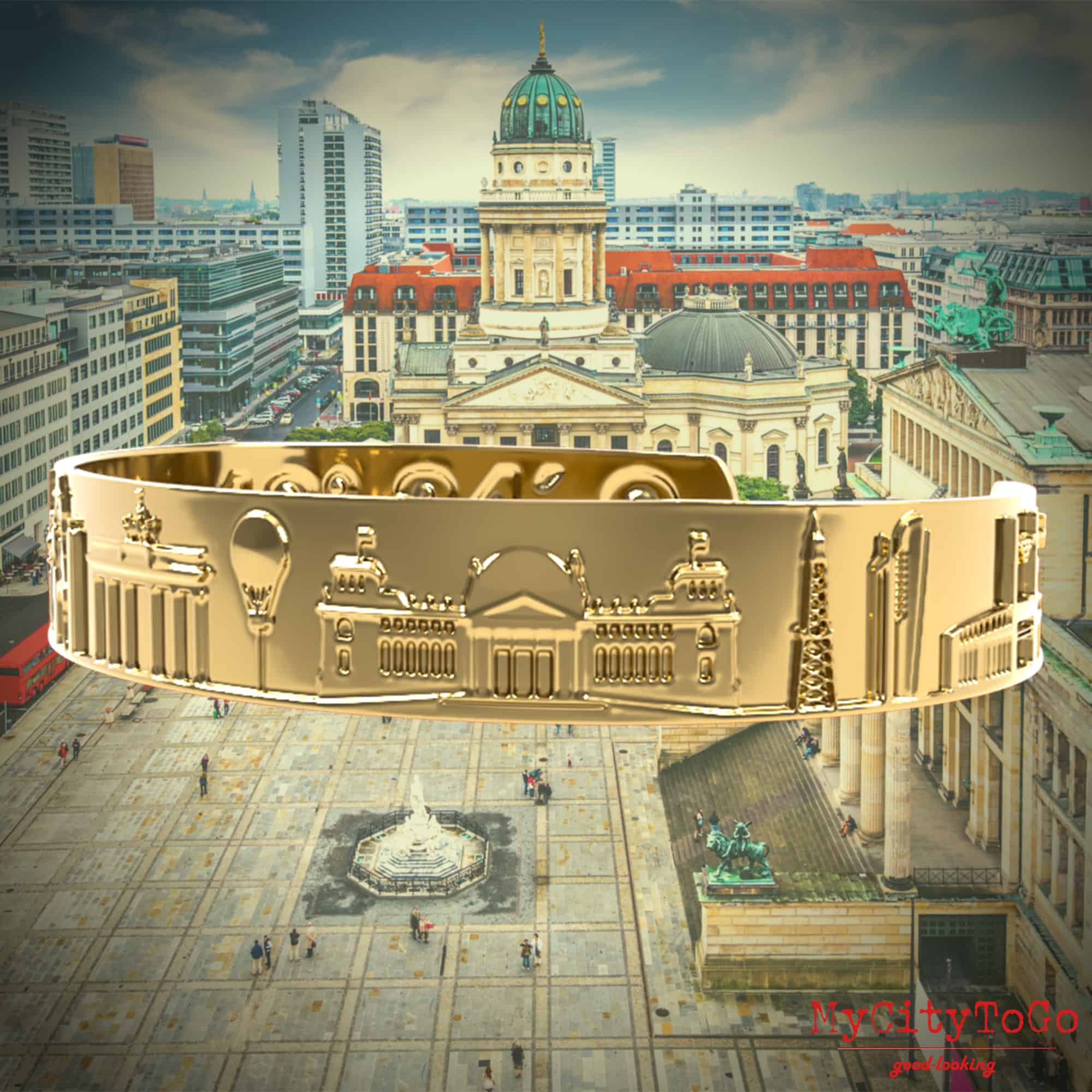 A golden bracelet with famous motifs and coordinates from the city of Berlin