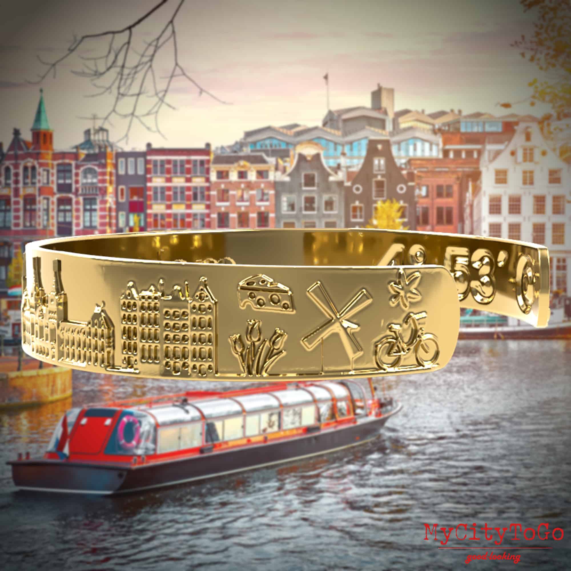 golden bracelet from mycitytogo with motifs and coordinates from the city of Amsterdam