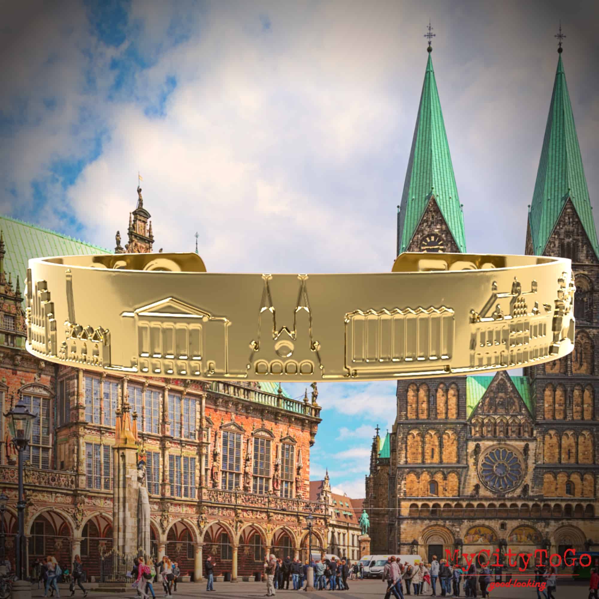 Goldfarbener Armreif mit Motiven der Stadt Bremen