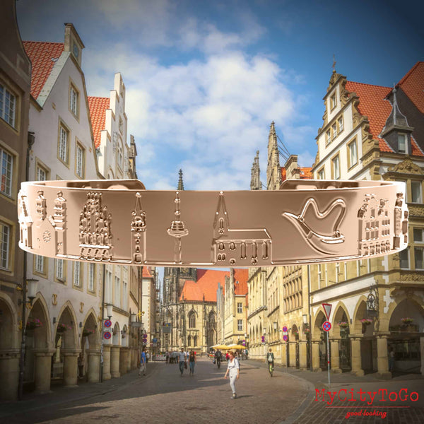 Armreif mit Reliefs bekannter Motive der Stadt Münster in Rotgold