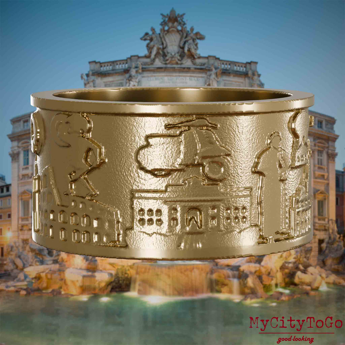 Ring aus vergoldetem Edelstahl mit Reliefs bekannter Sehenswürdigkeiten der Stadt Rom. Den Hintergrund bildet eine Ansicht der Stadt Rom.