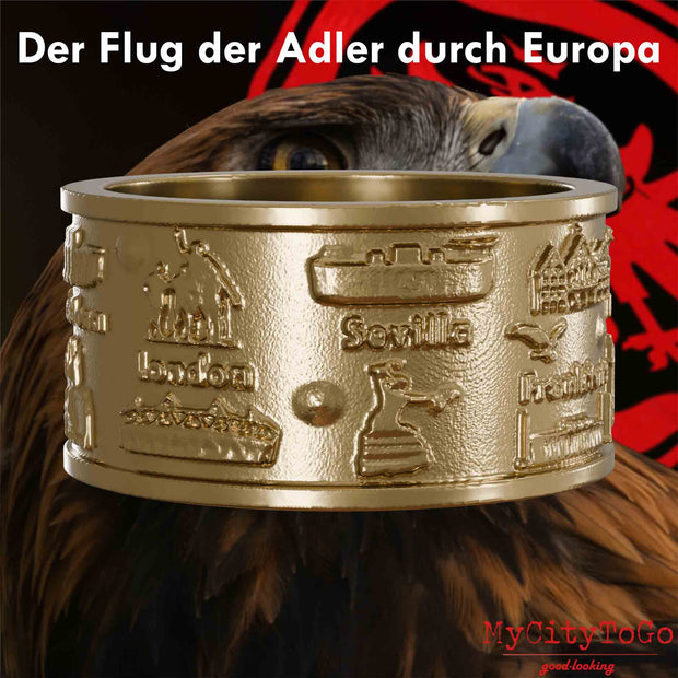 Ring aus vergoldetem Edelstahl mit Reliefs bekannter Sehenswürdigkeiten der Spielorte und Stadien der Frankfurter Europa-League-Saison 2021/22 mit einem Adlerkopf als Hintergrund