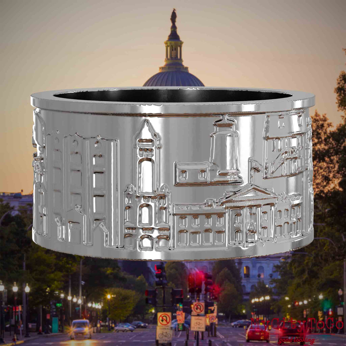 Silberner Ring mit Reliefs bekannter Sehenswürdigkeiten der Stadt Washington. Den Hintergrund bildet eine Ansicht der Stadt Washington.