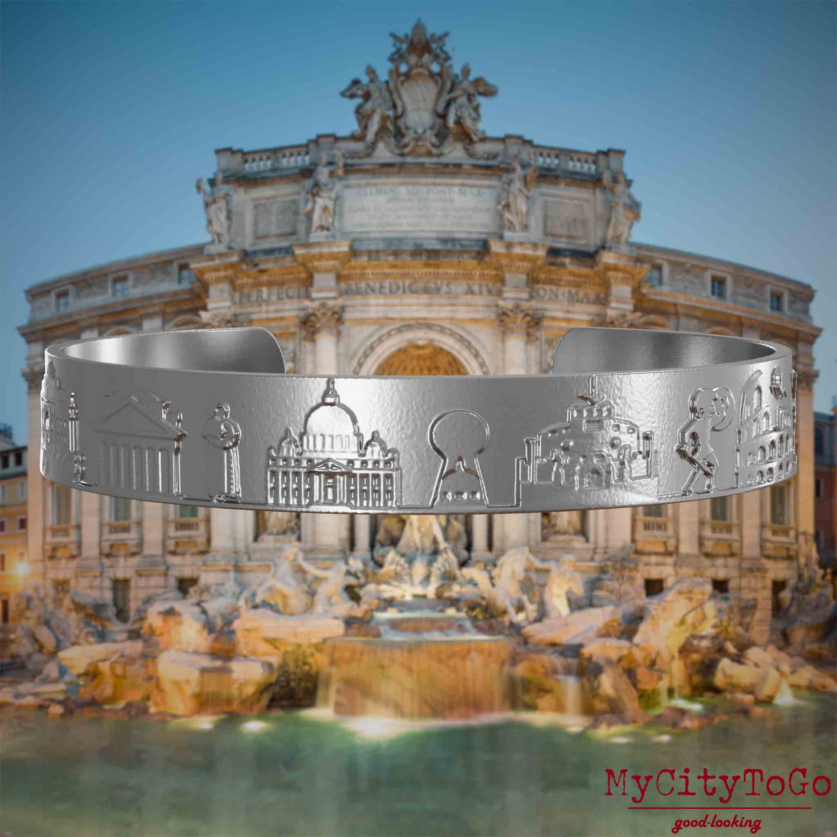 Armreif aus Edelstahl mit Reliefs bekannter Sehenswürdigkeiten der Stadt Rom. Den Hintergrund bildet eine Ansicht der Stadt Rom.