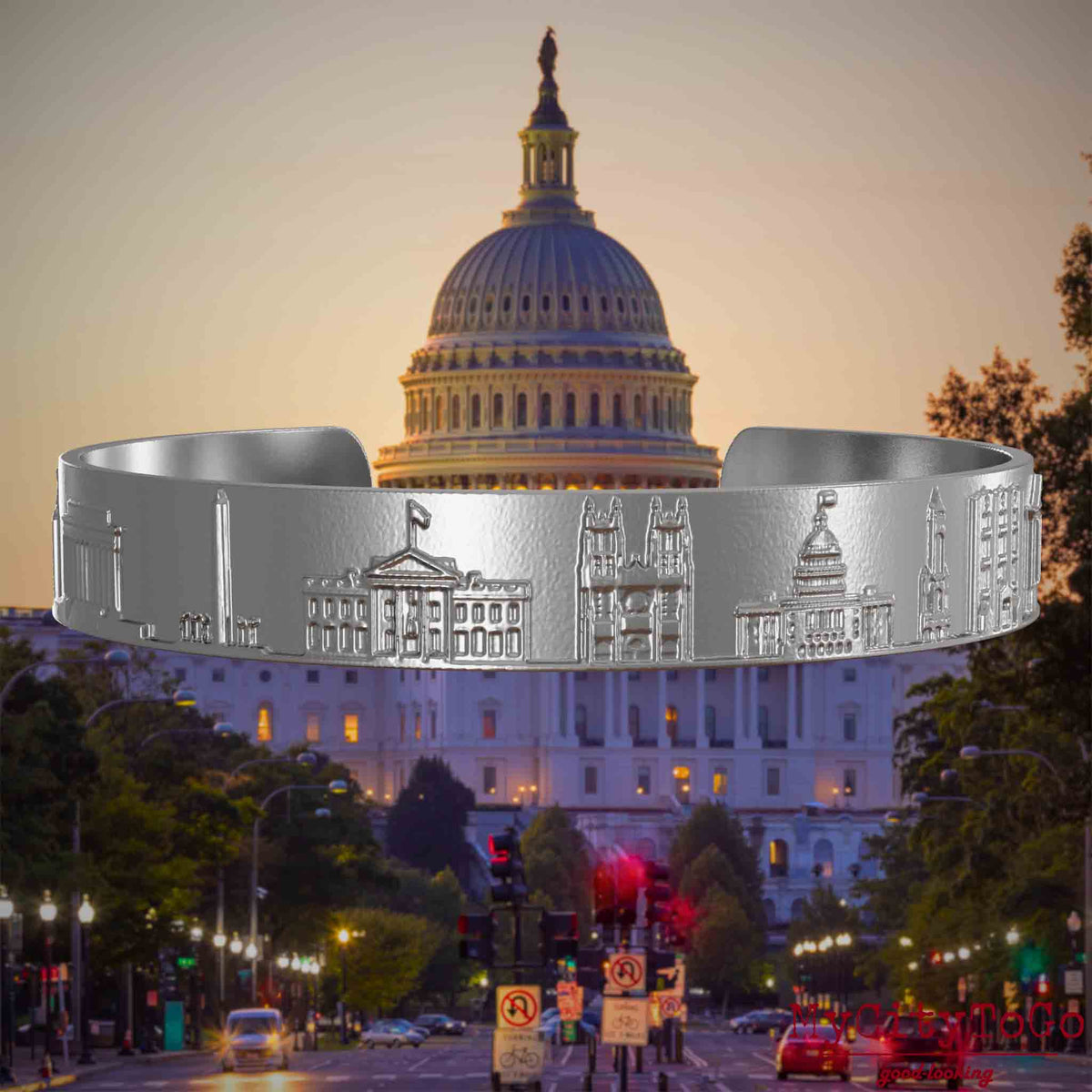 Armreif aus Edelstahl mit Reliefs bekannter Sehenswürdigkeiten der Stadt Washington. Den Hintergrund bildet eine Ansicht der Stadt Washington.
