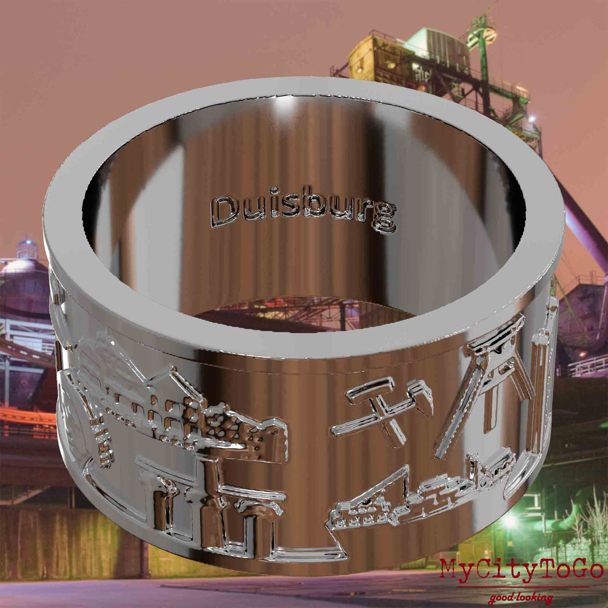 Versilberter Ring mit Reliefs bekannter Sehenswürdigkeiten der Stadt Duisburg und einer Gravur des Stadtnamens auf der Innenseite. Den Hintergrund bildet eine Ansicht der Stadt Duisburg.