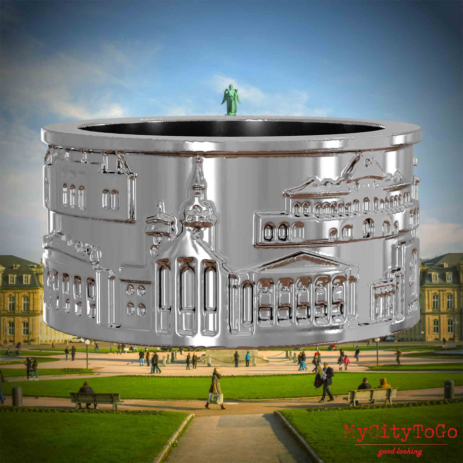 Silberner Ring mit Reliefs bekannter Sehenswürdigkeiten der Stadt Stuttgart. Den Hintergrund bildet eine Ansicht der Stadt Stuttgart.