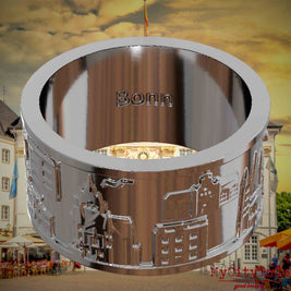 Versilberter Ring mit Reliefs bekannter Sehenswürdigkeiten der Stadt Bonn und einer Gravur des Stadtnamens auf der Innenseite. Den Hintergrund bildet eine Ansicht der Stadt Bonn.