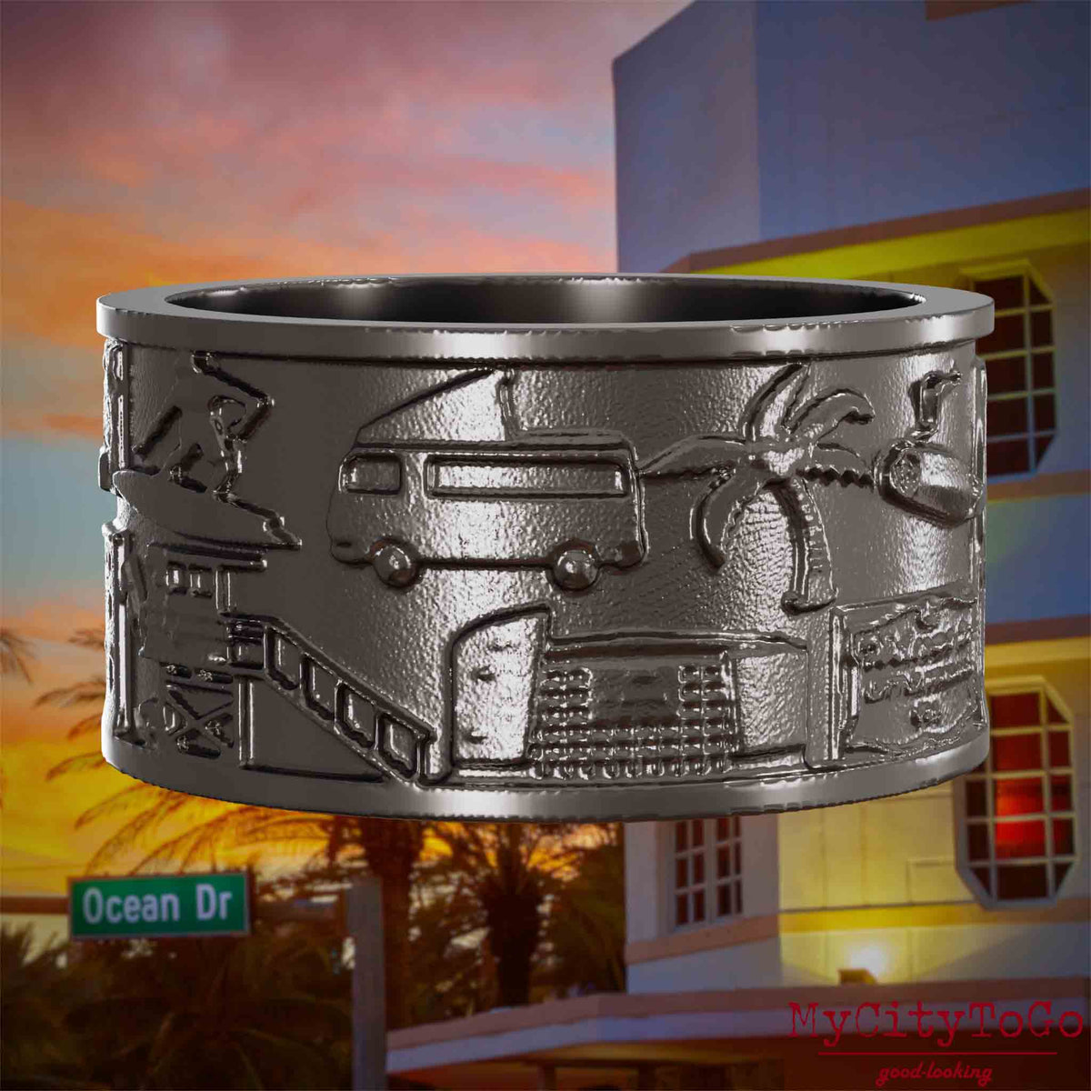 Ring aus Titan mit Reliefs bekannter Sehenswürdigkeiten der Stadt Miami. Den Hintergrund bildet eine Ansicht der Stadt Miami.