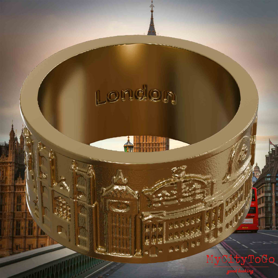 Ring aus vergoldetem Edelstahl mit Reliefs bekannter Sehenswürdigkeiten der Stadt London und einer Gravur des Stadtnamens auf der Innenseite. Den Hintergrund bildet eine Ansicht der Stadt London.