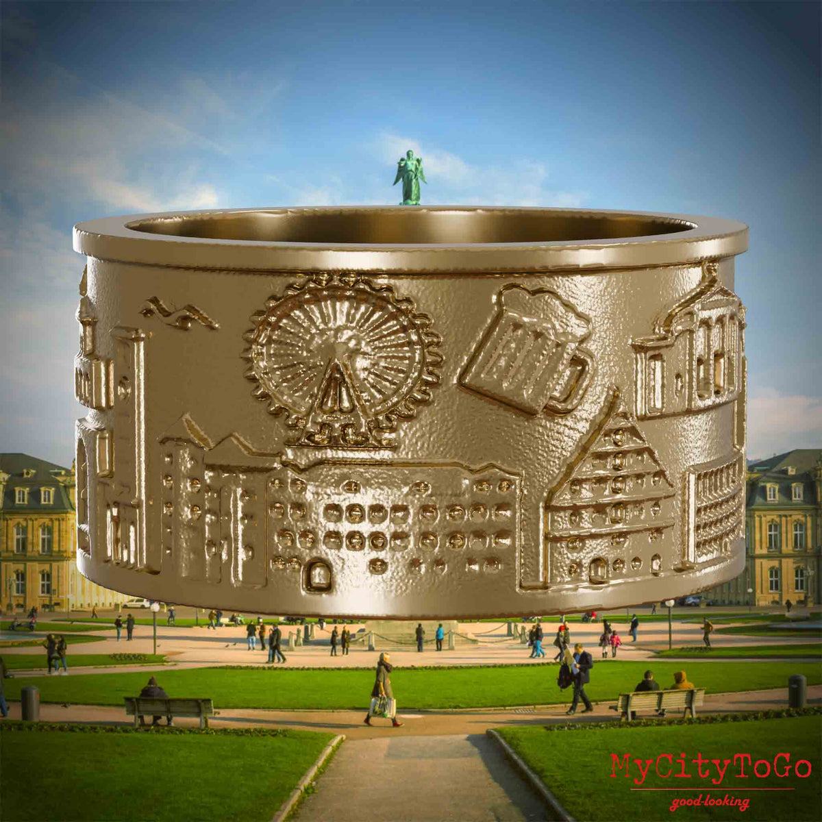 Ring aus vergoldetem Edelstahl mit Reliefs bekannter Sehenswürdigkeiten der Stadt Stuttgart. Den Hintergrund bildet eine Ansicht der Stadt Stuttgart.
