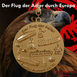 Gold-plated jewelry pendant with reliefs of stadiums and landmarks of the host cities for the final round of Frankfurt’s 2021/22 Europa League season on the front side